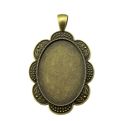 Scalloped oval pendant setting front view on a white background
