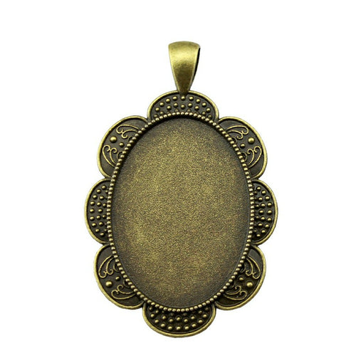 Scalloped oval pendant setting front view on a white background