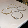 Crystal Cross Hoop Earrings in Gold and Silver Tone view 2