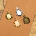 Teardrop Scallop Pendant Trays in Five Metal Finishes view 1