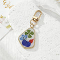 Irregular Pressed Flower Resin Keychains in Six Designs view 6