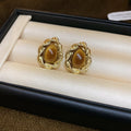 Brown Stone Look Stud Earrings in Round and Ornate Shapes view 7