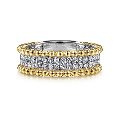 Close front studio shot of dual-tone beaded edge pave band