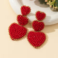 Red Crystal Bead Three Tier Heart Drop Earrings Gold-Tone Trim view 2
