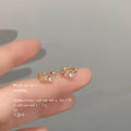 Gold-Tone Mini Star Clear Stone Huggie Hoop Earrings view 4