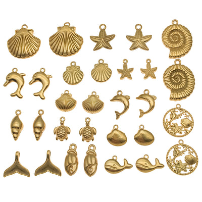 Gold-tone starfish charms arranged on a light background