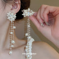 White Floral Pearl Tassel Drop Earrings With Decorative Details view 1