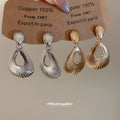 Ridged Open Teardrop Clip On Earrings in Silver with Polished Details view 1