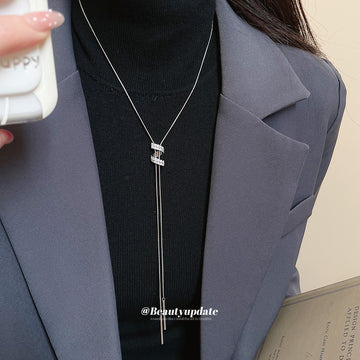 Crystal S Pendant Lariat Necklace with Distinctive Textured Details