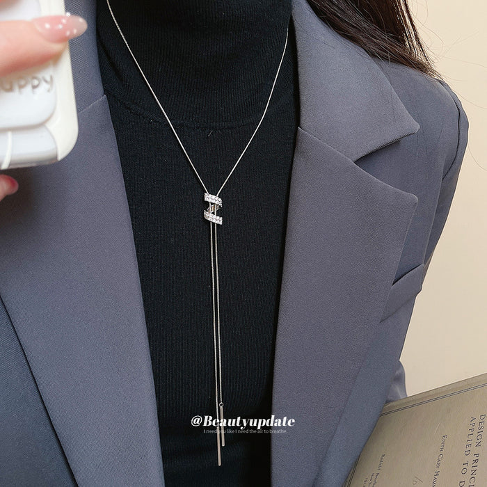 Crystal S Pendant Lariat Necklace with Distinctive Textured Details