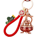 Pearl Filled Treasure Bowl Keychains in Red Gold and Purple view 5