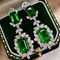 White Gold Tone Green Emerald Cut Crystal Drop Earrings view 2