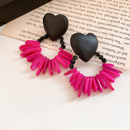 Wooden Heart and Floral Statement Stud Earrings Two Styles shown in a styled close-up