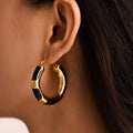 Gold Black Enamel Oil-Drip Hollow Hoop Earrings Stainless Steel view 4