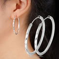 Faceted Silver Tone Large Hoop Earrings Polished Jewelry Accessory view 6