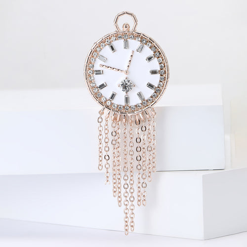 Alternate finish view of round clock face above multiple fine chain tassels