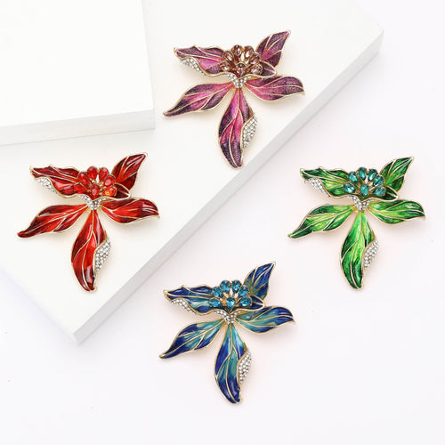 Four enamel iris brooches red purple green and blue