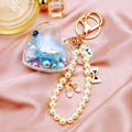 Clear Heart Preserved Flower Keychains with Pearl Loops in Six Colors view 5