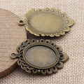Antique Bronze Oval Cabochon Setting with Ornate Frame view 2