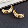 Layered Ridged Crescent Stud Earrings in Two Metal Tones view 6