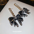 Black Bow Drop Earrings with Clear Crystal Trim and Pearl Accents view 2