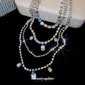 Silver Tone Layered Crystal Necklace with Geometric Drops view 4
