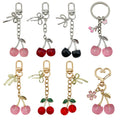 Cherry Charm Keychains Featuring Red Cherry Across 29 Pictured Variations view 5