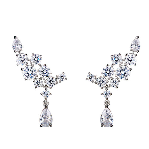 Second product view showing silver-tone asymmetric floral clear-stone long drop earrings