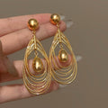 Gold Layered Open Teardrop Earrings with Round Stud Tops view 6