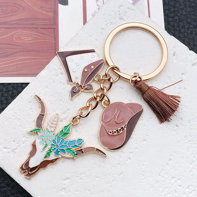 Overview showing the available color and design variations of the brown western hat floral longhorn metal keychain
