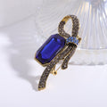 Crystal Ribbon Loop Brooch with Polished Metal and Decorative Accents view 9