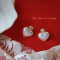 Iridescent Pearl Heart Stud Earrings Gold Crystal Heart Top view 4