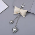 Glossy Patent Bow Keychain with Two Dangling Heart Charms view 7