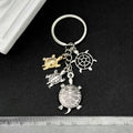 Silver Tone Turtle Family and Starfish Keychain with Metal Hardware view 4