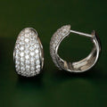 Pave Dome Huggie Hoop Earrings In Gold And Silver Tones view 1