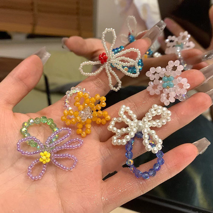 Three Mixed Beaded Rings In Pink Lavender Green Blue And White