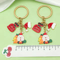 Christmas Charm Keychains Featuring Santa Across 41 Pictured Variations view 3