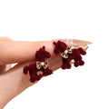 Red Flocked Horse Bow Stud Earrings with Distinctive Textured Details view 5