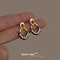 Gold Black Leopard Enamel Linked Teardrop Earrings view 1