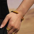 Open Cuff Bracelet With Heart Ends In Gold And Steel Tone view 3