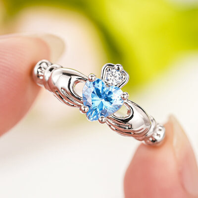 Product view showing silver-tone crowned heart Claddagh ring