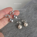 Silver Tone Knot Pearl Like Stud Earrings In White And Gray view 1