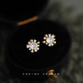 Gold Tone Clear Stone Sunflower Earrings In Clip And Stud Styles view 1
