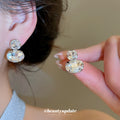Oval Crystal Cluster Stud Earrings in Two Styles With Silver-Tone Settings view 4