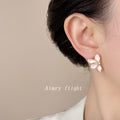 Soft Pink Enamel Three Petal Flower Crystal Stud Earrings view 2