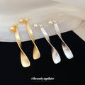 Twisted Ribbon Long Drop Earrings In Gold Tone Or Silver Tone view 3