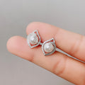 Pearl Center Teardrop Halo Stud Earrings in Silver Tone view 3
