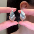 Textured Leaf and Pearl Stud Earrings in Two Tones view 7