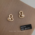 Gold CZ Gourd Outline Stud Earrings Champagne Pearl view 1