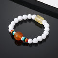 Multicolor Bead Stretch Bracelets with Carved Barrel Center Beads view 2